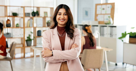 Media agency, portrait and woman with arms crossed, happiness and pride with project management. Person, confidence and journalist with smile, publishing startup and magazine editor with creativityの写真素材