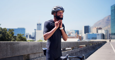 Start, sports and black man with helmet in city ready for exercise, training and active hobby...