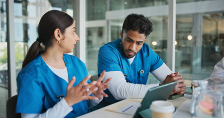 Hospital, tablet and nurses in meeting with paperwork for patient results, medical report and...