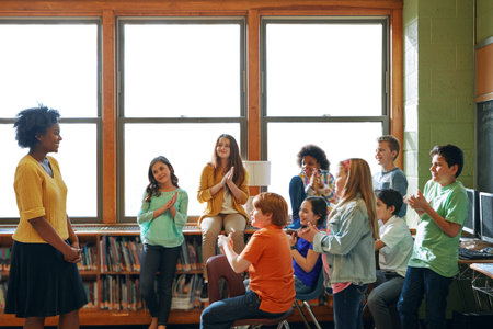 Education, teacher and children with clapping in classroom for exam success, test results or goals....