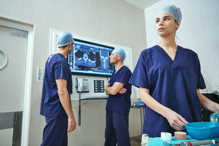 Surgeon, woman and instruments preparation in theater for operation, healthcare and procedure....