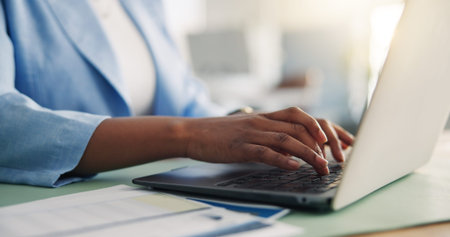 Laptop, paperwork and hands of business woman in office for online project, finance report and...