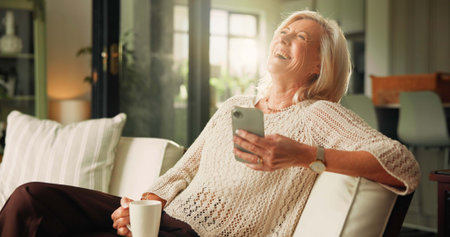 Home, smartphone and old woman on sofa, funny meme and internet social media. Apartment, happiness...