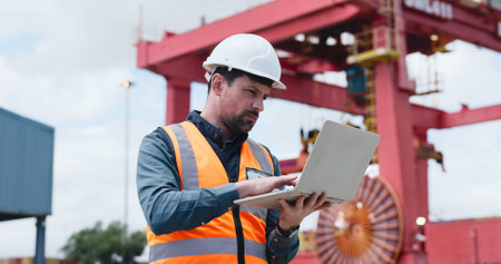 Construction site, reading or man with laptop for inspection, architecture plan or infrastructure...