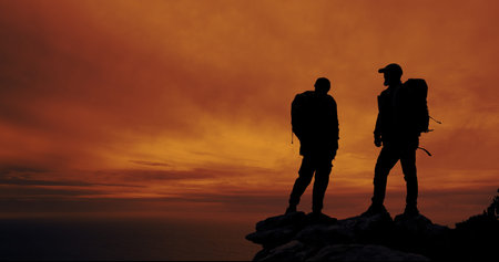 Sunset, silhouette and men hiking on mountain with space for vacation, adventure or holiday. Travel,...