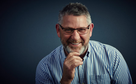 Portrait, CEO and businessman with glasses, laughing and ambition for career growth and mockup...