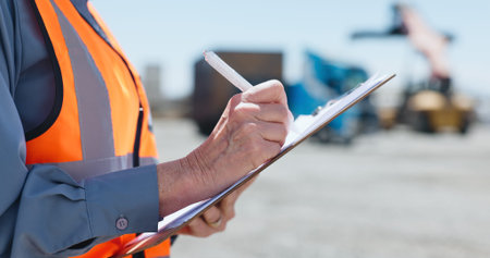 Hands, shipping yard and man with clipboard, export and inspection for cargo distribution. Closeup,...