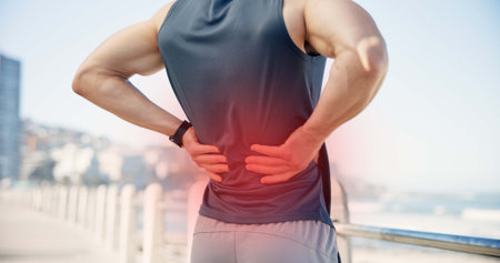 Man, hands or back pain with red glow on promenade for spine injury or workout accident. Active,...