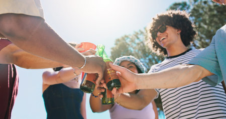 Hands, friends and drinks cheers outdoor for reunion celebration, social gathering or bonding....