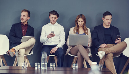 Business people, group or waiting room with technology in row for job search or opportunity. Team,...
