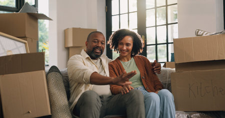 Moving, talking or couple on couch in new home, rest or investment commitment for real estate...