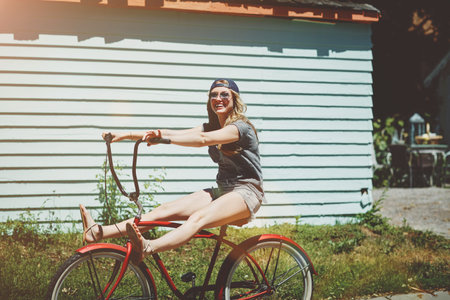 Cycling, happy and portrait of woman with bicycle for travel, journey and fun adventure in...