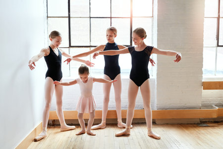 Ballet, girl and class with dance for teaching, training and art in studio for theatre performance...
