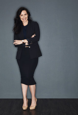 Happy, business and woman with arms crossed in studio for career pride, about us and lawyer. Mockup...