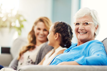 Portrait, grandmother and mom on sofa with child, connection and bonding together on weekend break....