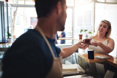 Coffee, order or service with barista and customer in cafe for hospitality, startup or thank you....