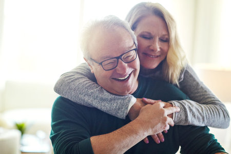 Hug, love and trust with old couple in home together for marriage bonding, security or relationship....