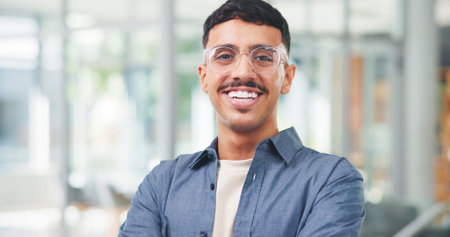 Portrait, business and man with smile in office for career pride, about us and news reporter. Happy, person and journalist with ambition, copywriting experience and internship at publication agencyの写真素材