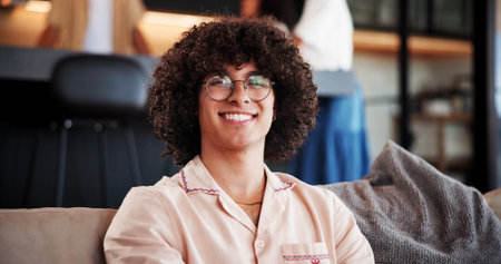 Happy, portrait and man with glasses, home and confident on break in lounge, resting and...