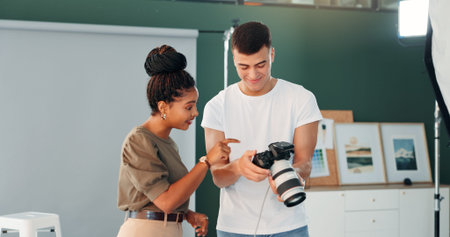 Talking, photographer and model with camera for photoshoot, review image or smile for project...