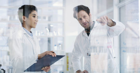 People, scientist and writing with glass board for planning, experiment results or problem solving....