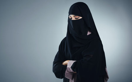 Thinking, nostalgia or Muslim woman in studio with space, memory or sad in mindset. Reflection,...