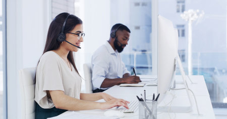 Typing, woman and consultant in call center with computer, customer care and crm for service....