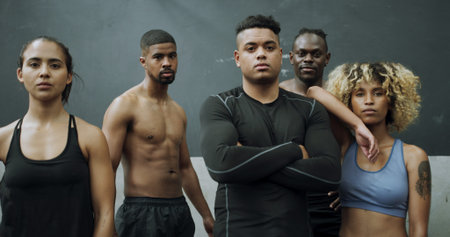 Fitness, portrait and serious friends in gym for commitment, dedication or training results. Development, exercise and proud with group of confident athlete people in health club for workout benefitsの写真素材