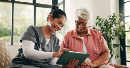Feedback, healthcare or tablet with nurse and old woman talking in home living room for review. App,...