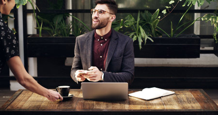 Laptop, coffee and waitress with businessman in cafe for customer service, order or hospitality....
