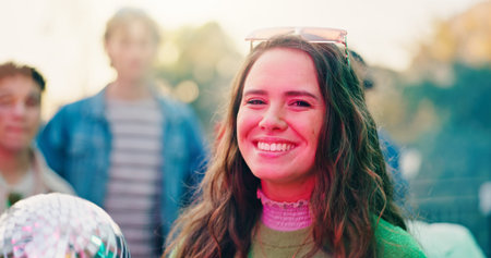 Portrait, friends and woman with disco ball at party, outdoor social event and get together for...