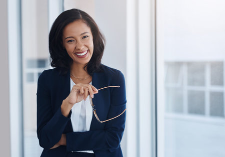 Smile, glasses and portrait of business woman in office for corporate, financial advisor or pride....