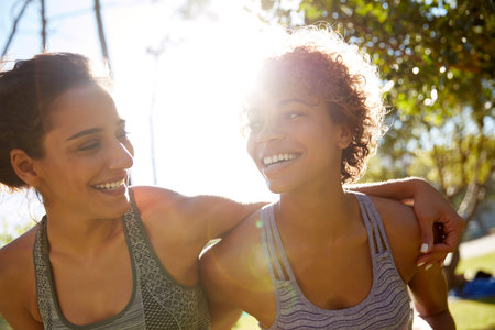 Friends, hug and happy people at park for fitness, summer training partner and support for body...