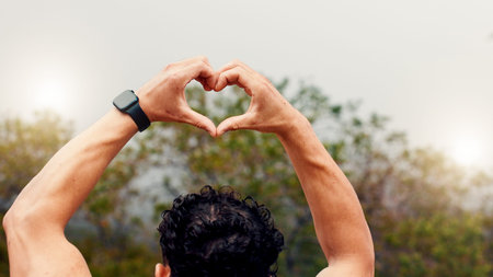 Hiking, heart hands and man in forest, back and fitness for wellness, workout progress and sign....