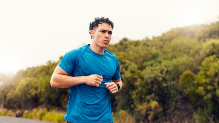 Health, runner and fitness with man in nature for workout, performance and cardio challenge....