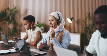 Happy woman, consultant and team with headset in call center for customer service or online advice....