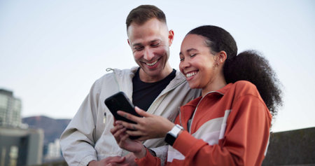 Happy couple, fitness and phone with break in city for meme, notification or share post on bridge....