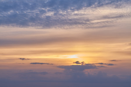 Sunrise, orange and blue sky with clouds for weather, atmosphere and empty space. Natural,...