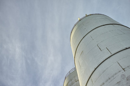 Silo, sky and architecture for sustainability, low angle and property space for business. Outdoor,...