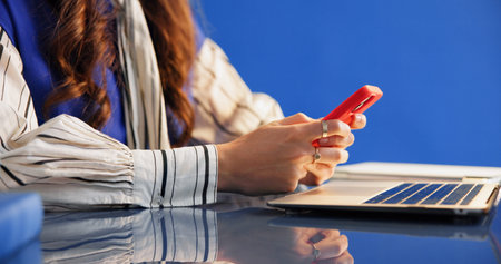 Laptop, phone or hands of person in office, typing business email or online communication for...