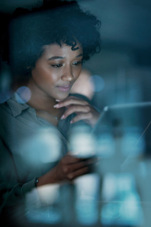 Night, thinking and business woman on tablet for insurance, financial claims and policy review....