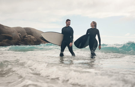 Surfer, friends and smile with beach, travel and nature for ocean hobby and vacation fitness. Woman,...