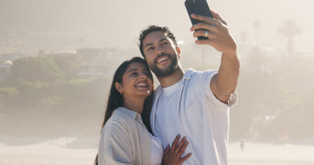 Love, smile and selfie with couple on beach for travel, summer and vacation together. Profile...