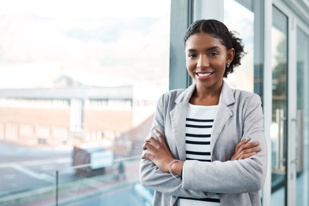 Crossed arms, confident and portrait of business black woman with ambition, company pride and...