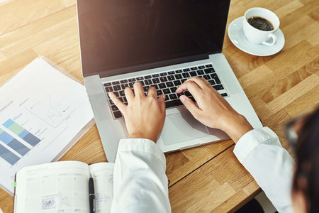 Business, hands of woman and laptop for typing in office for email, project research and connection....