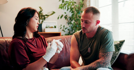 Needle, consultation and nurse with man on sofa in home for medical checkup with immunization....