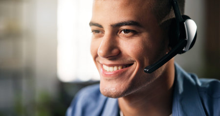 Smile, remote work or man with headset in home, problem solving or consulting for troubleshooting...