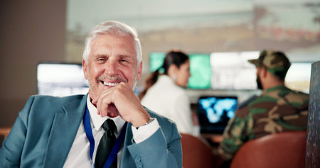 Commander, portrait or mature man on base with smile, career pride or ambition as military chief....