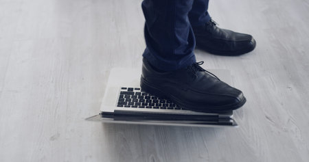 Feet, person and stand on laptop to damage tech, technical issues and hardware failure. Frustrated,...