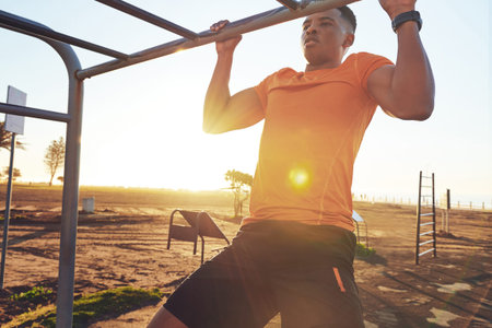 Black man, pull up and bar outdoor with fitness exercise, strength training and body balance....